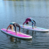 women doing yoga on a Cruiser SUP® stand up paddle board - Xcursion Classic