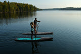 man and woman stand up paddle boarding on Cruiser SUP® V-Max Woody 11'6 on a lake