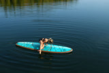 woman doing yoga on a Cruiser SUP® stand up paddle board - Xpedition Woody