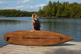 woman carrying a Cruiser SUP® stand up paddle board - V-Max Woody 11'6