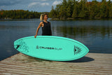 woman carrying a Cruiser SUP® stand up paddle board - Escape Classic