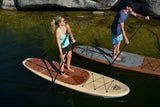 man and woman stand up paddle boarding on Cruiser SUP® Xplorer Woody on a lake