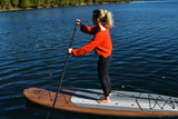 woman stand up paddle boarding on Cruiser SUP® Xplorer Classic on a lake