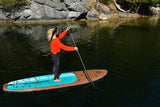 woman stand up paddle boarding on Cruiser SUP® Xplorer Classic on a lake